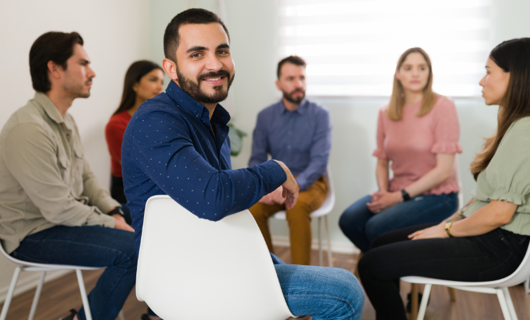 SGT Misconceptions About Therapy - Man in group therapy session